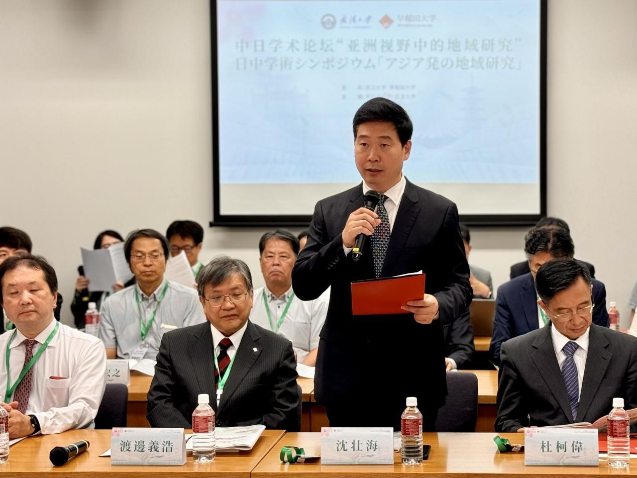 Professor Shen Zhuanghai, executive deputy secretary of the Party Committee of Wuhan University, delivers a speech at the opening ceremony, August 6, 2024. /CGTN